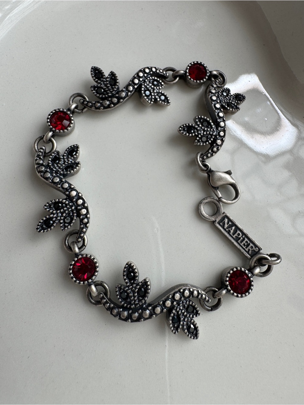 Vintage Napier Silver-Tone Leaf Bracelet with Red Crystal Accents
